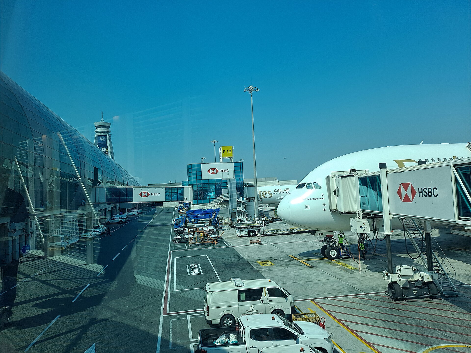 Dubai Airport | Indian Press An Airbus A380 is docked at a gate in Dubai International Airport, illustrating the flow of remittances.