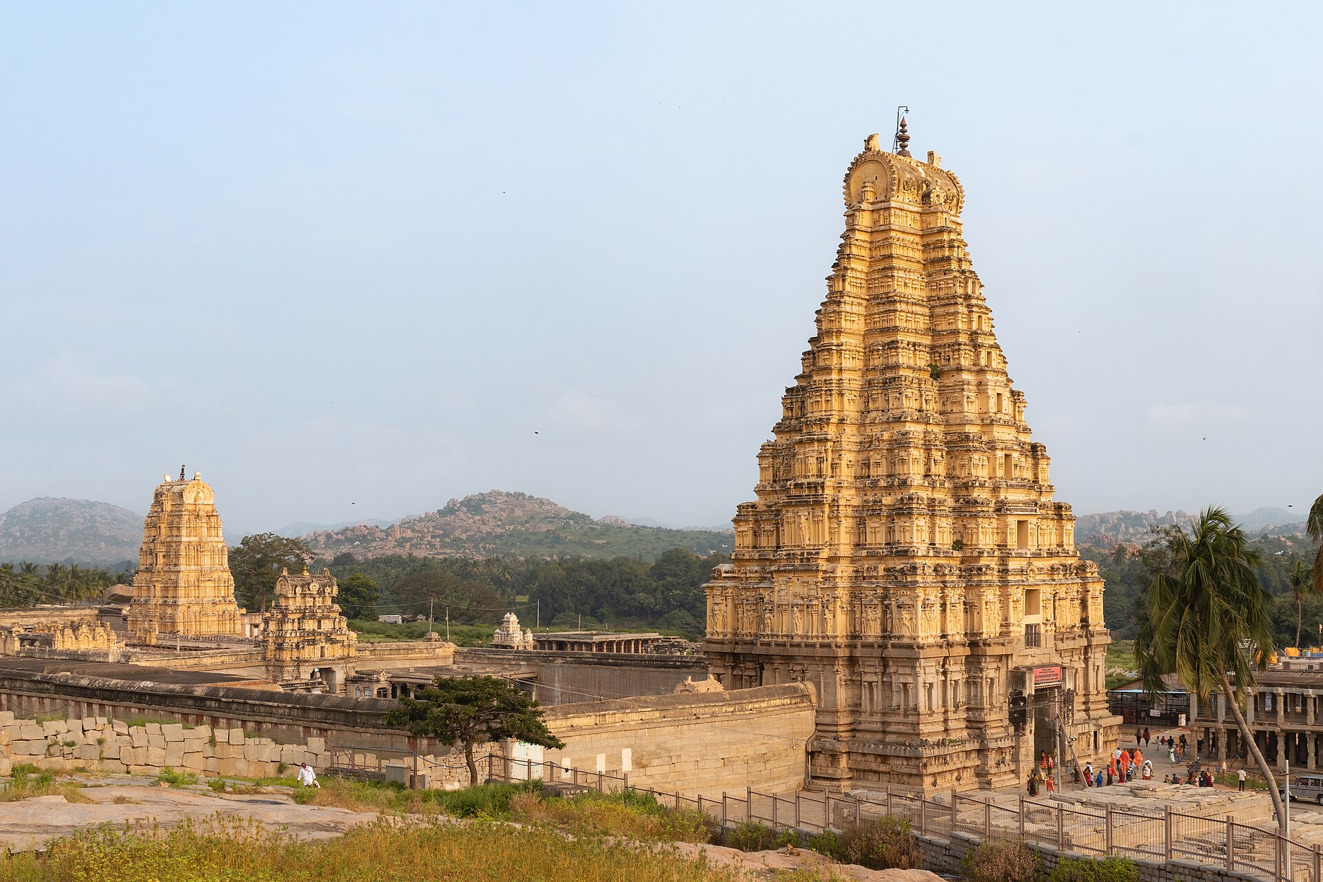 Virupaksha Temple | Indian Press Hampi’s Virupaksha Temple showcases ornate towers and ancient stone architecture, reflecting Karnataka's rich cultural.