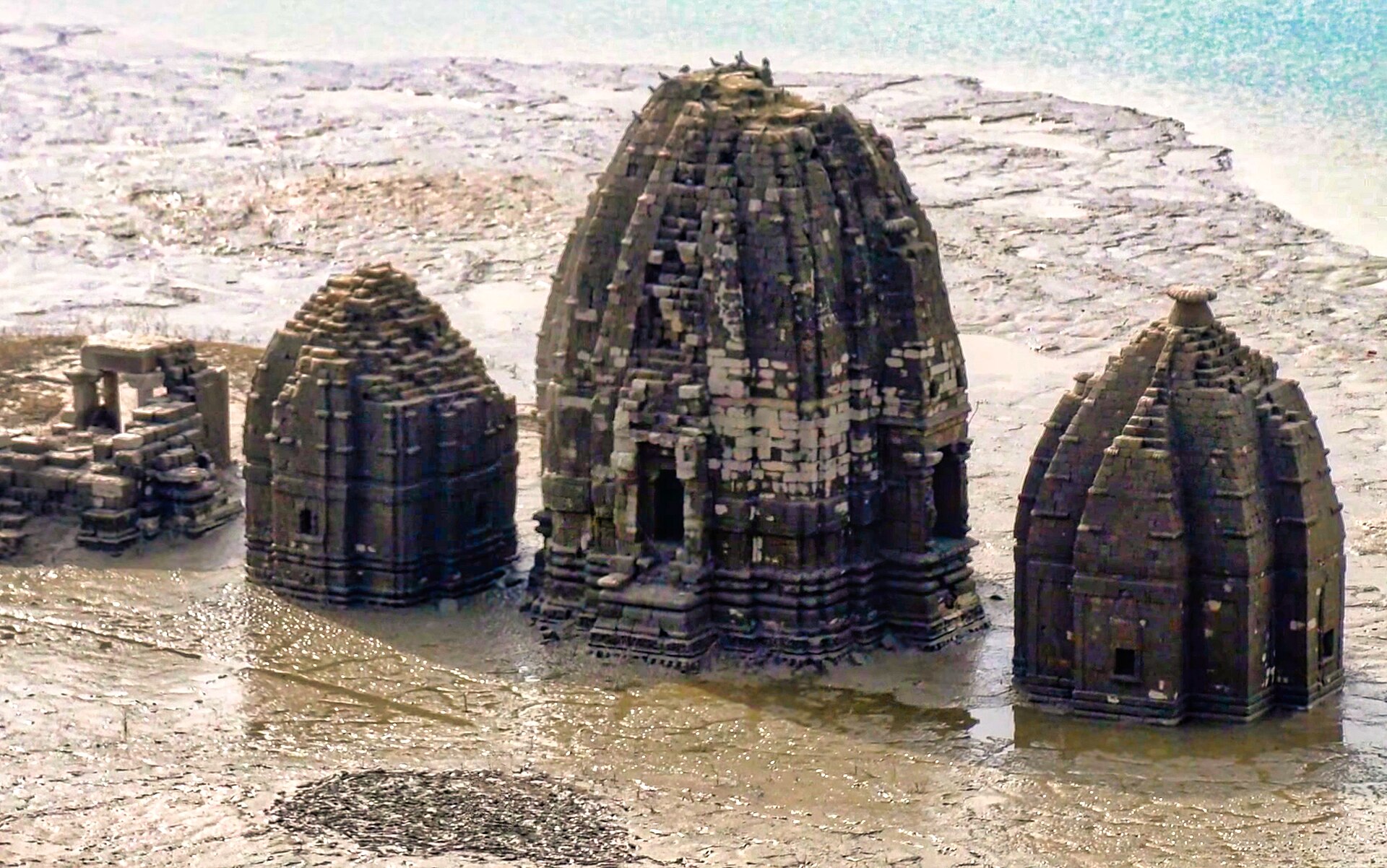 Kedarnath Temples | Indian Press Submerged temples rise from the waters of Kedarnath Wildlife Sanctuary in India, showcasing ancient architecture and.