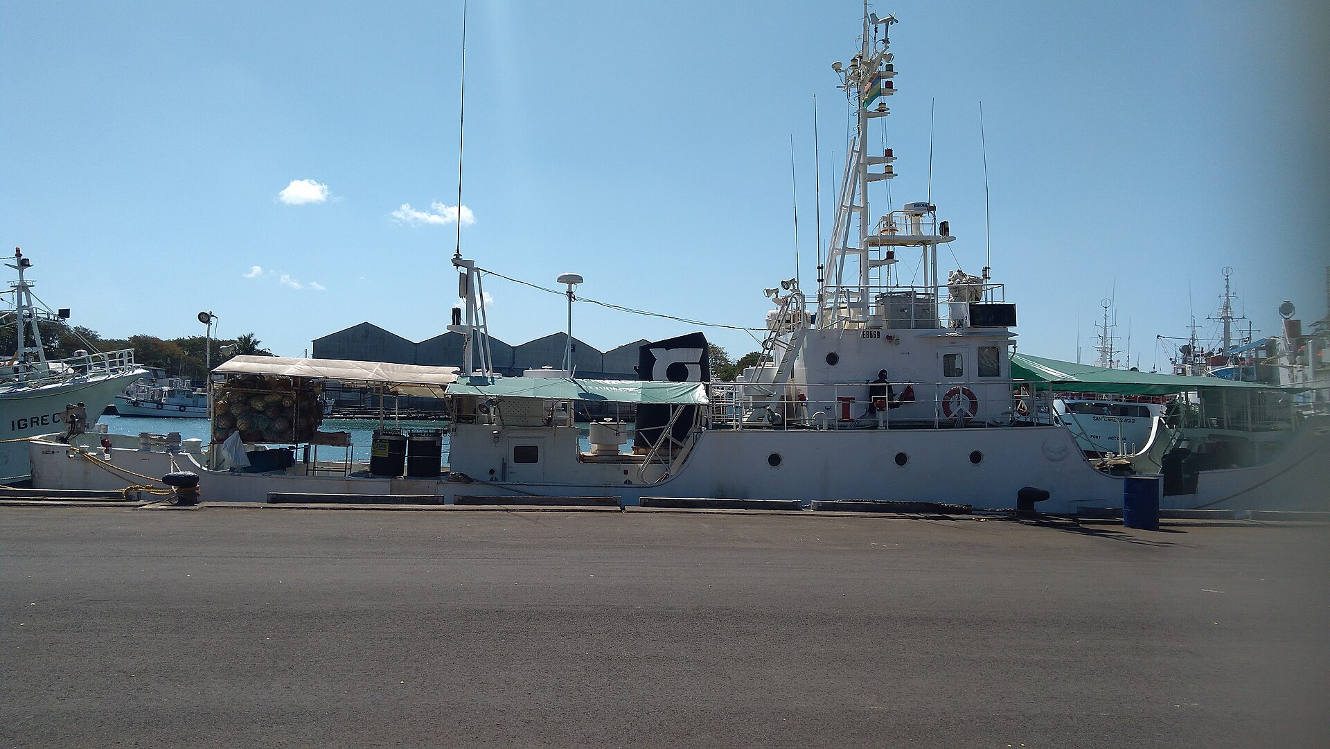 A research vessel is docked at Aapravasi Ghat museum in Port Louis, Mauritius, illustrating historical migration.