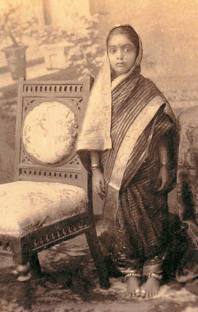 Nauvari Saree | Indian Press A vintage sepia portrait shows an Indian woman wearing a traditional nauvari saree.