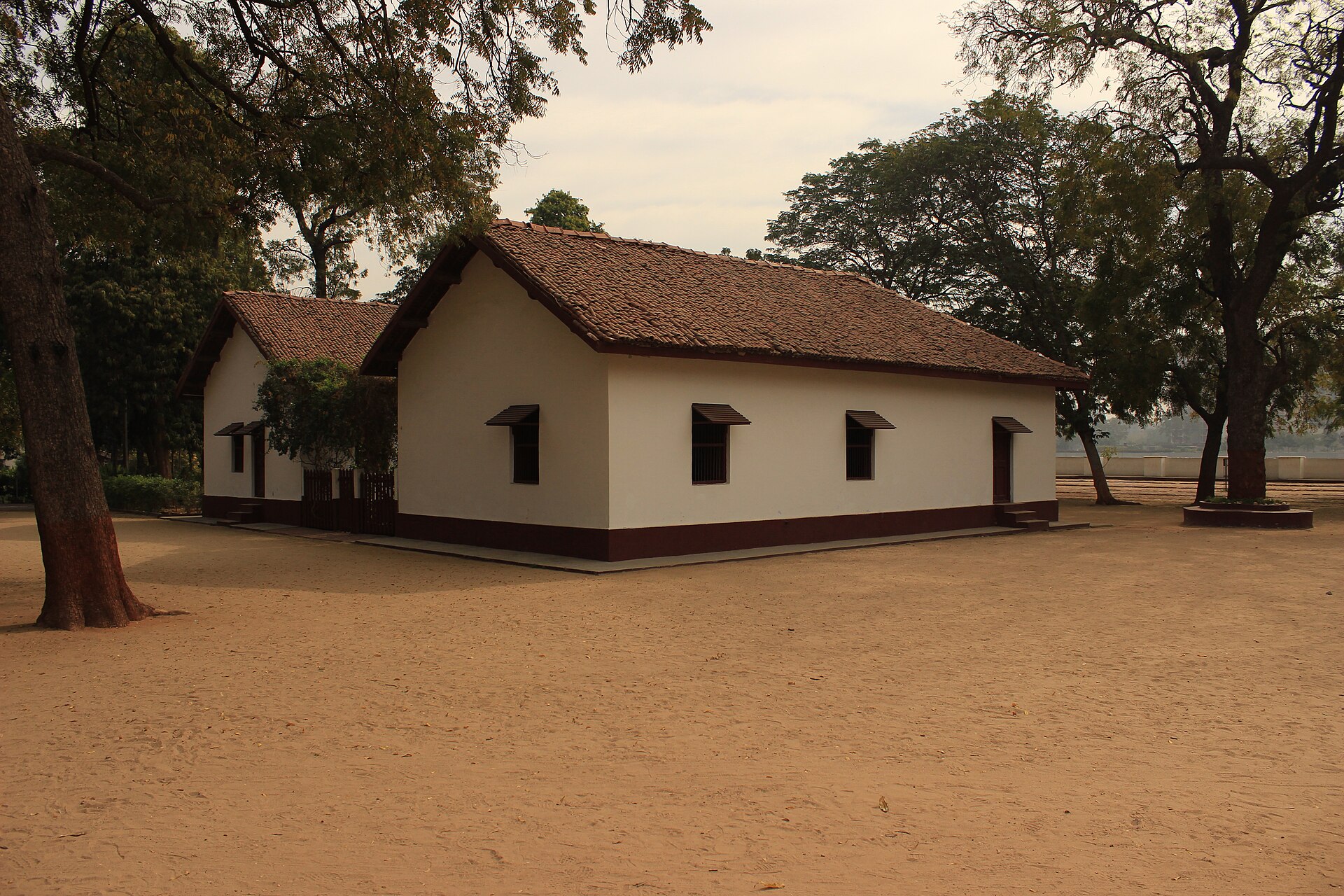 Sabarmati Ashram | Indian Press A single-story building with a tiled roof at Sabarmati Ashram, a key site in India's history of civil disobedience.