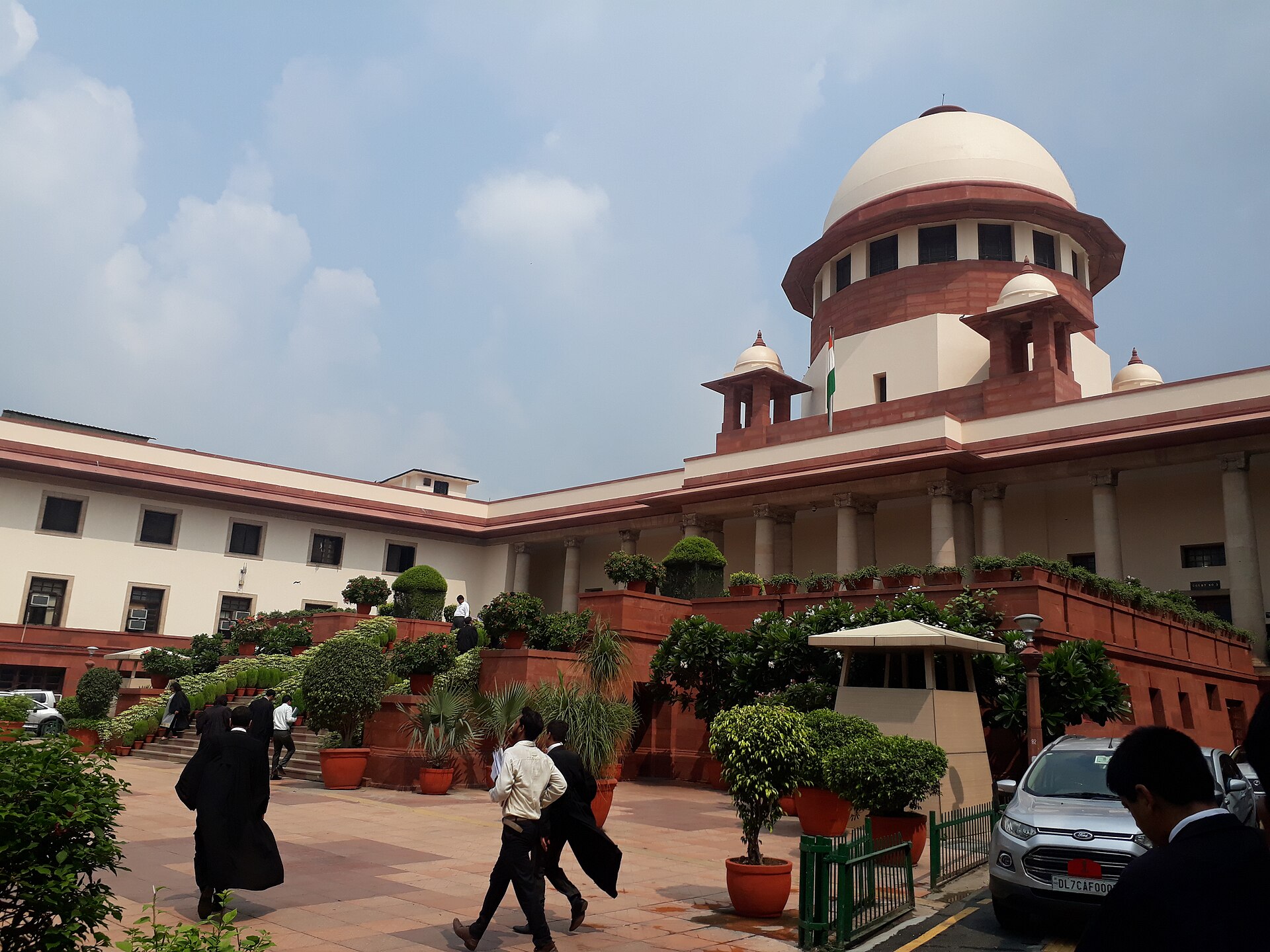 Supreme Court of India | Indian Press The Supreme Court of India building is pictured with gardens and people, relating to the Indian legal system.